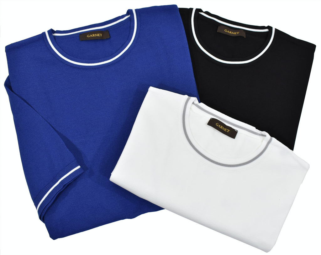 Fashion cotton tee with a crepe like finish adds depth and elegance to a basic look. The single color accent stripe along the edges adds a style to a clean sport look.  Soft banded sleeve and open bottom.  Classic shaped fit.   Colors: Black, Royal, White