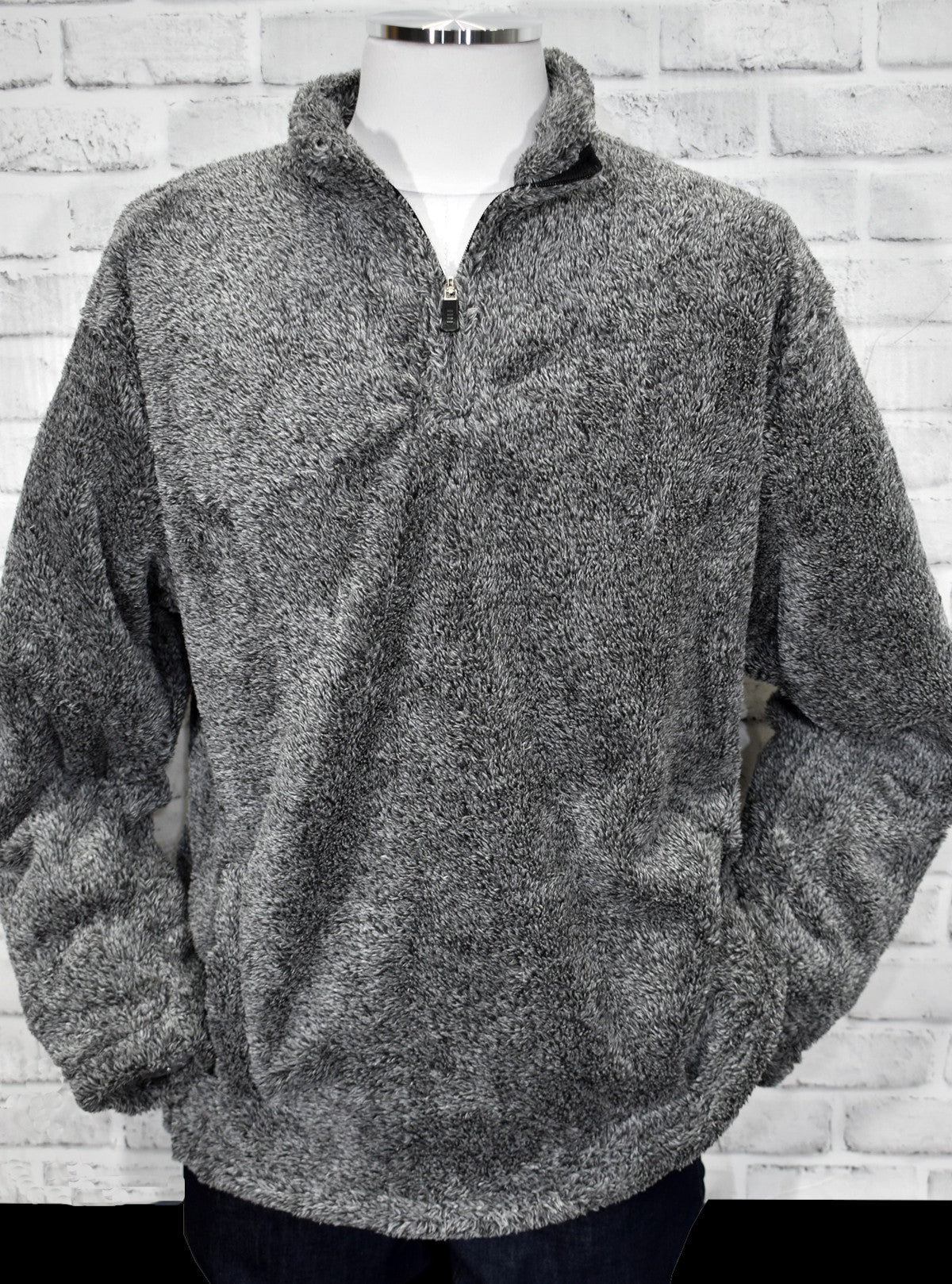 Great item for when you need to throw on something warm, soft and cool with a pair of jeans or sweats.   The soft grey coloration with a hint of charcoal/black highlights pairs well with any color combination.   Front kangaroo pockets and a soft zip mock for added comfort.  Polymicrofiber fabric, classic fit.