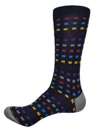 Exquisite Dion collection socks are knitted with extra fine mercerized cottons. The result is a rich feeling sock with crisp color depth.  Dark navy with multi colored boxes.  Mid to upper calf height.  Sizes 8-12.