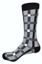 Mercerized cotton socks in a classic, yet fashion plaid pattern.  Spice up your accessories look without going too crazy.  Soft mercerized cotton.  Mid calf, fits sizes 9-12
