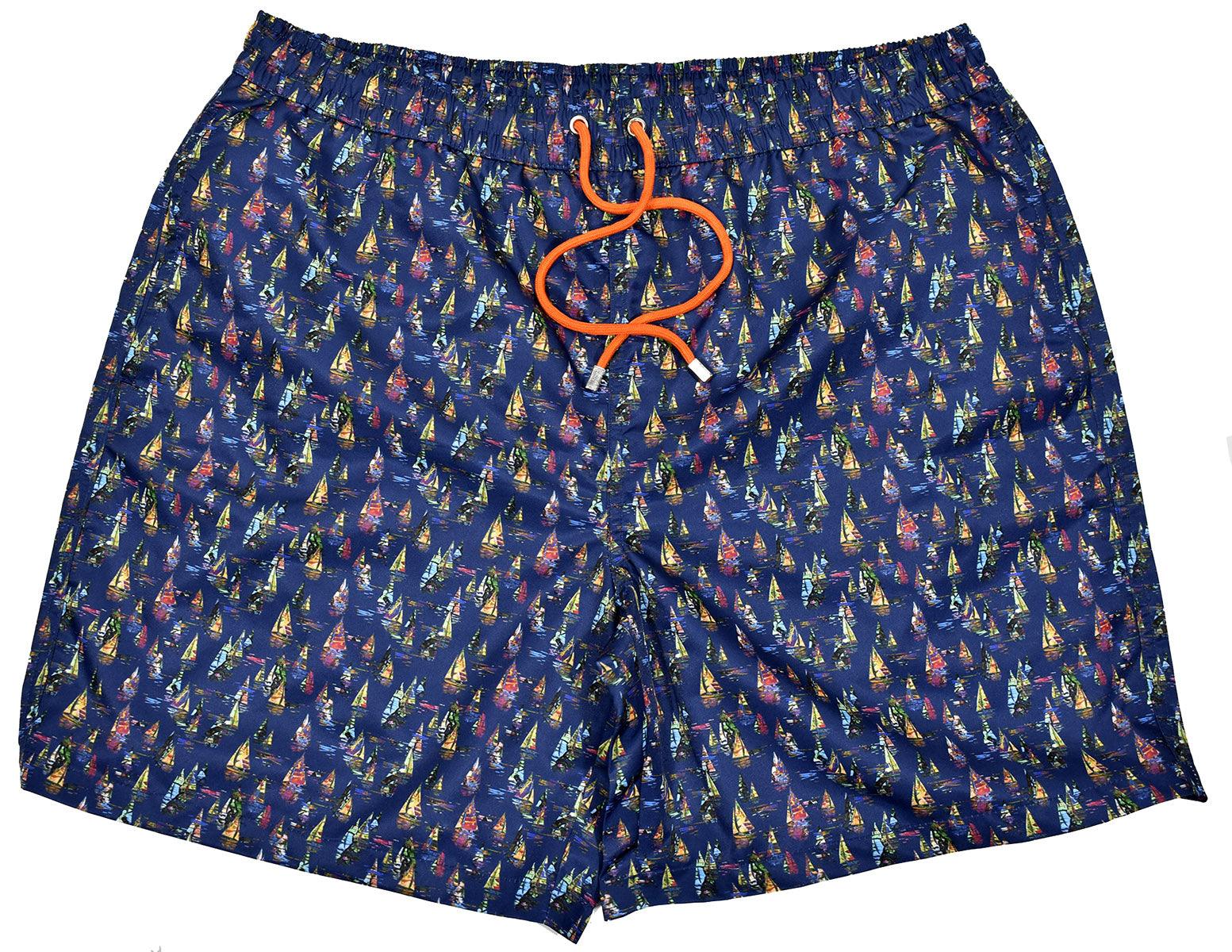 Our cool microfiber fabric swim shorts feature a unique pattern sure to set your image at the pool or beach.  Classic quick dry fabric. Elastic stretch waist band with fashion draw strings. Side slash pockets and back pocket. Mesh lining. Modern fit, order up one size if between sizes.  Sailing print swim suit, by Marcello Sport