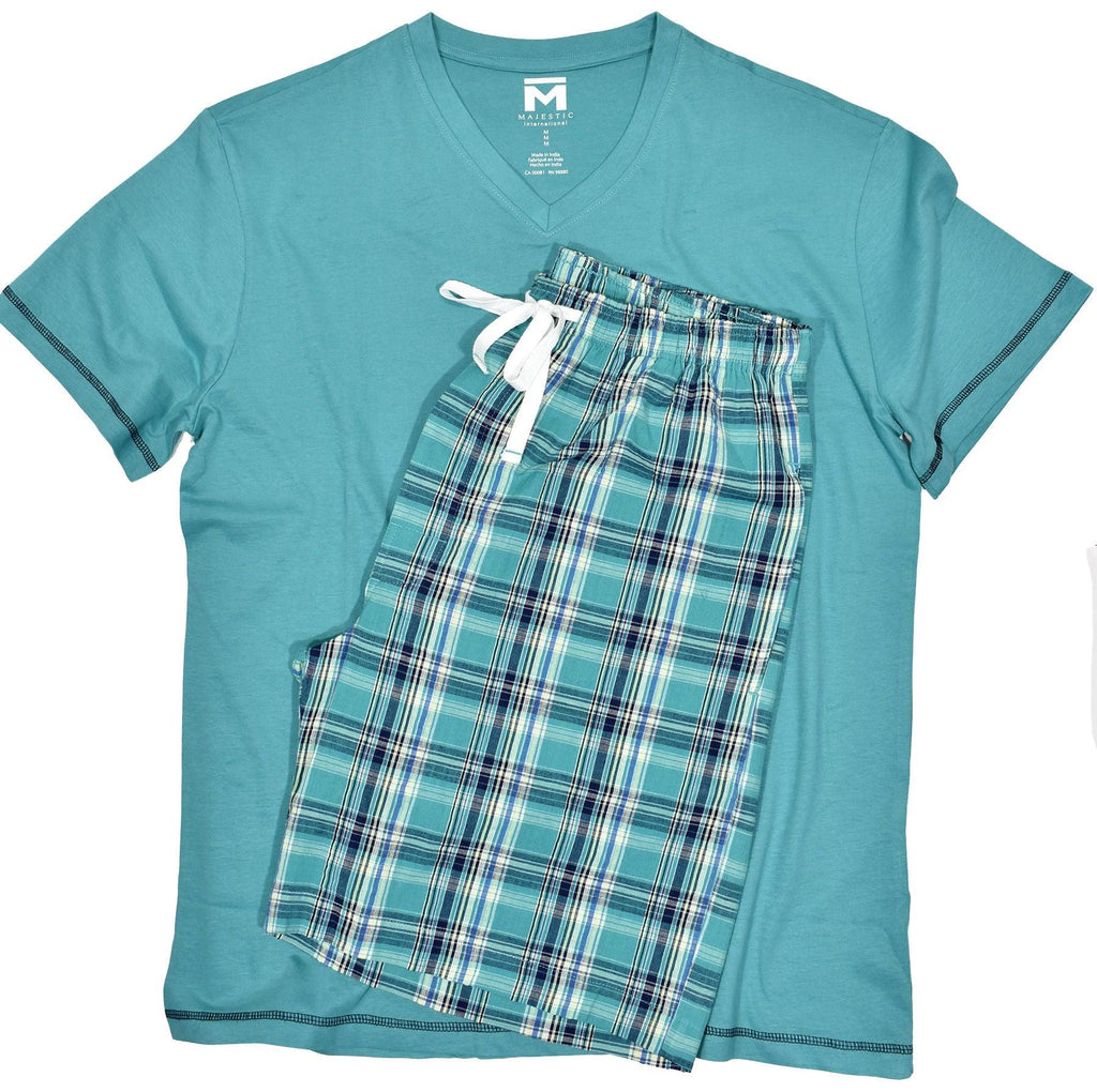 Your leisure lifestyle is enhanced with this coordinated set of a seersucker plaid short and pima cotton lux tee.  Color coordinated to work perfectly together and a great gift idea.  Available in Teal, as pictured, or Royal.  Cotton textured seersucker type short. Pima cotton lux tee with accent stitch detailing. Classic short pockets, stretch waist band and classic tie front. Classic fit.