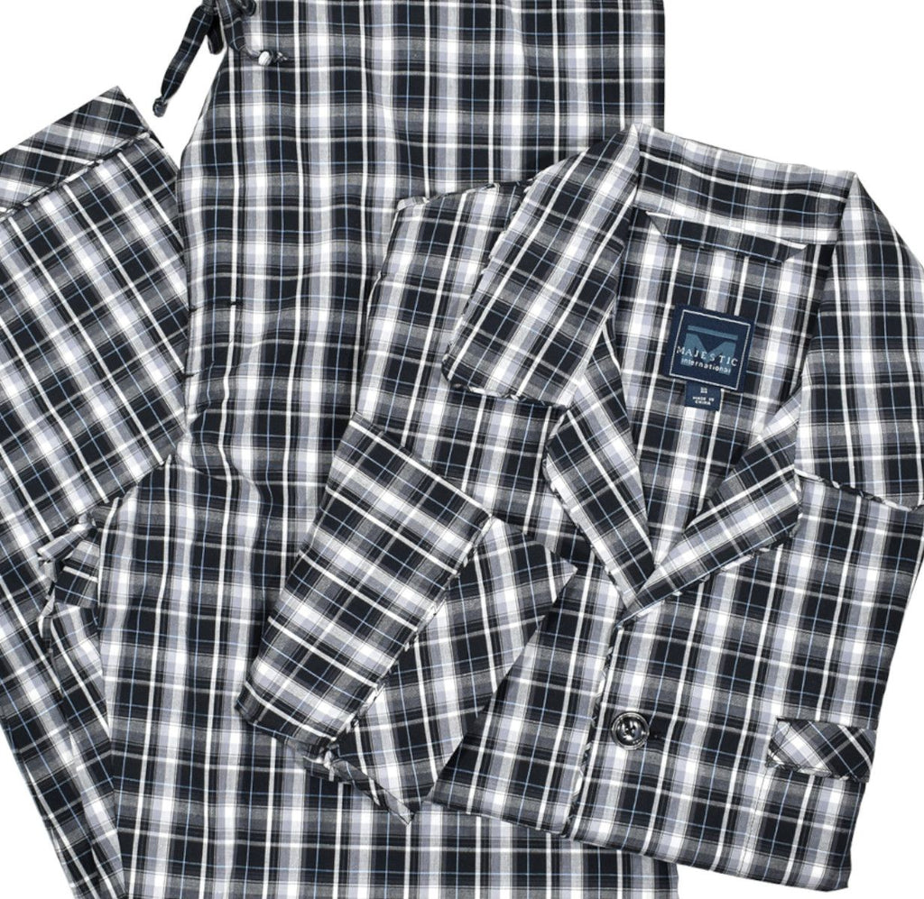 The black watch plaid pajama on soft cotton fabric is classic style perfect for any man. Black edge piping to finish the look.   Button front top with chest pocket.  Drawstring pant with stretch waist and button closure fly.  Classic fit.