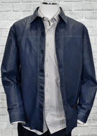 The ZM3393 Navy Washed Dean Leather Jacket is truly an timeless piece. It is constructed with butter soft leather and features a washed look that adds texture and interest. Stylish welted seams, classic side slash pocket, light soft lining and a classic button enclosure finish the jacket perfectly. With a medium length and raised stitch detailing, this classic fit jacket is sure to become a wardrobe staple. Classic fit, imported.