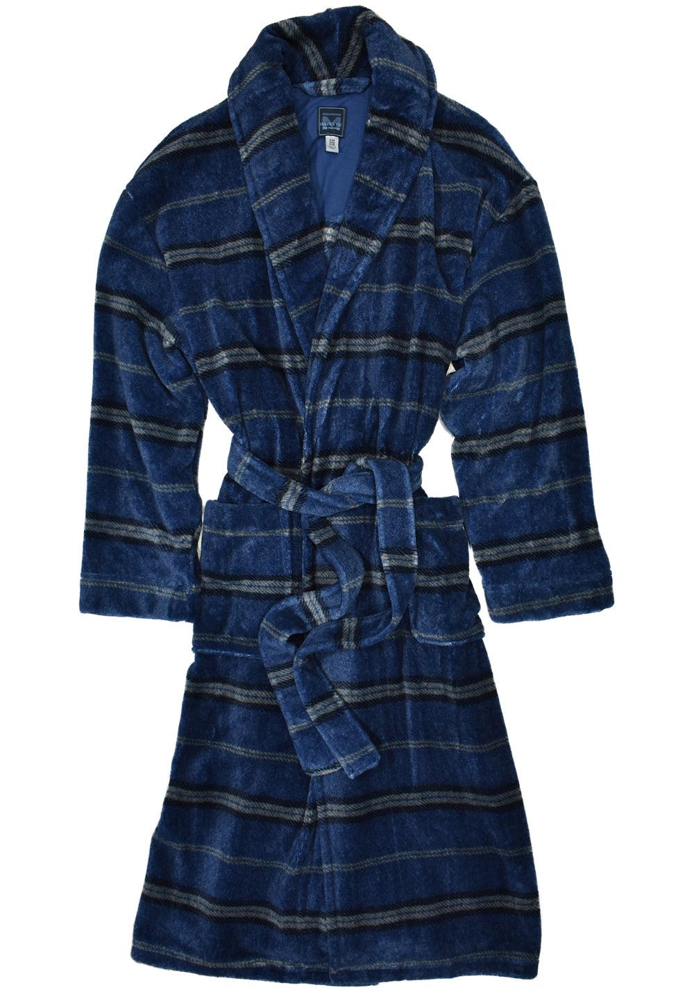 Wrap yourself in this plush robe and you’ll never want to take it off. Super soft and comfy it is an ideal gift for him or her!   Traditional yet updated fashion plaid pattern.  Indigo Plaid Plush Robe  Plush microfiber is super soft and easy care. Medium weight. Tie belt front. Classic front patch pockets. Small/Medium or Large/X-Large.