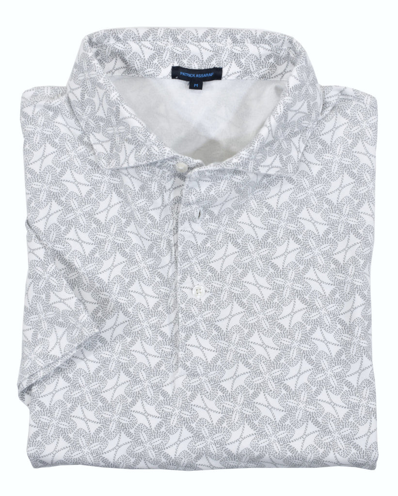 Cozy, elegant and rich Pima cotton polo with a self fabric collar, open sleeve and side vent slits. White ground fabic with a soft grey geometric linked pattern.  The updated geometric pattern adds style.  Classic shaped fit.