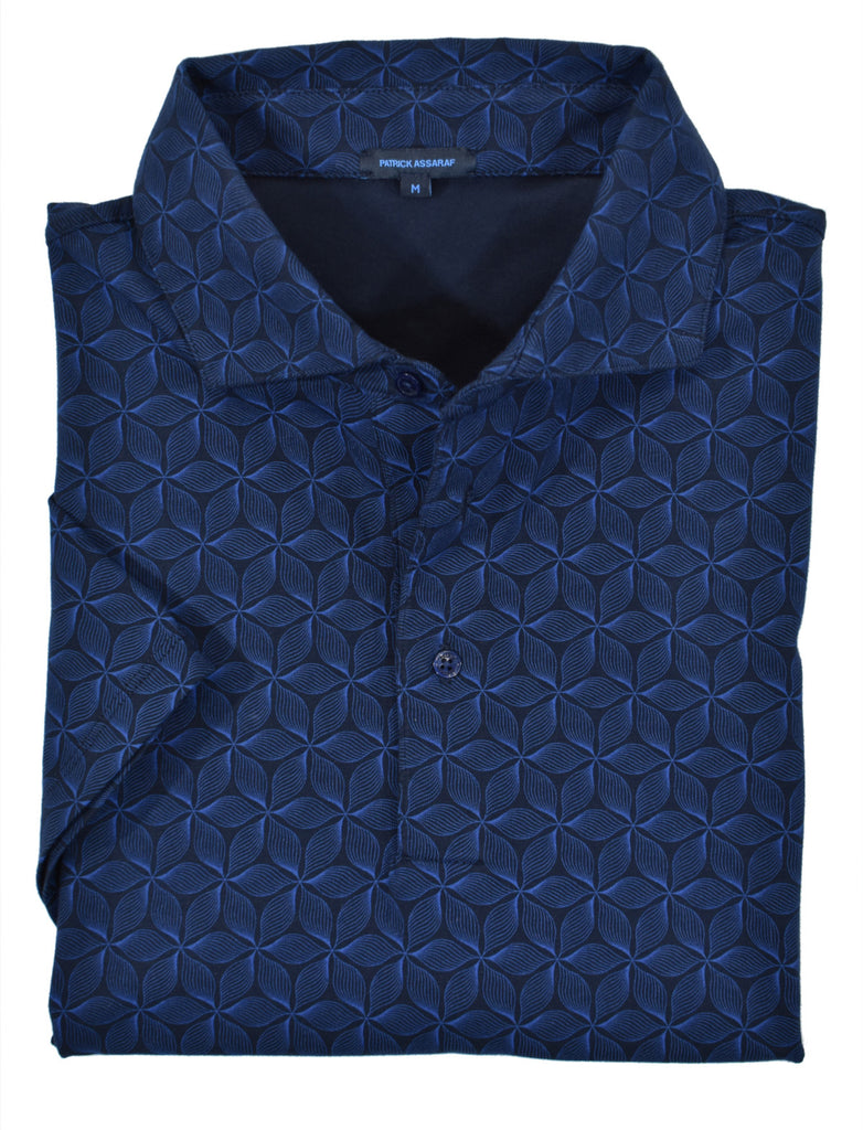 Performance microfiber fabric, in a rich dark navy and blue geometric, can be worn anytime and always looks great.  Self collar fabric for an updated style and open sleeve. Soft feeling and easy care fabric.  Classic shaped fit.
