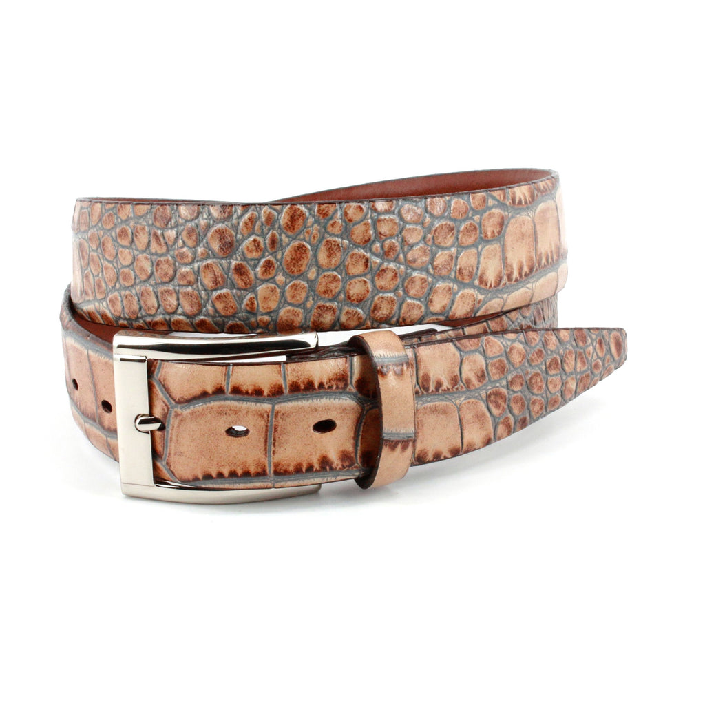 Soft Italian calf leather in tan with a staining technique to add slate gray accents.   An outstanding look with any cool jeans.   Classic silver buckle.  35mm or 1 7/16"  Assembled in the USA.