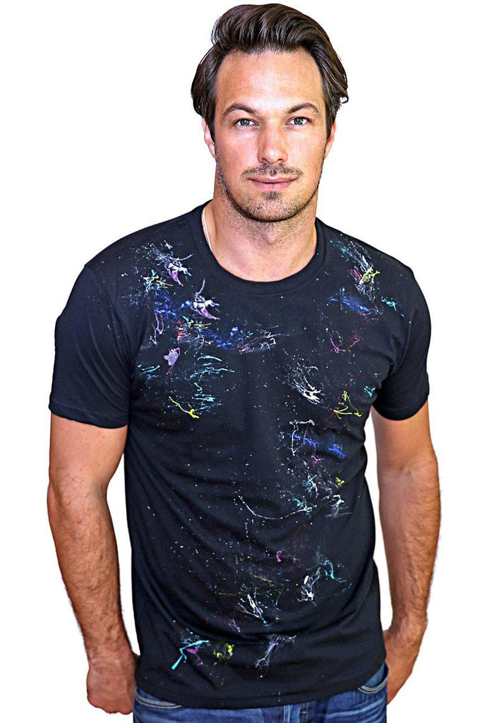 Tee shirts are not just tee shirts anymore. Our hand painted Tees are individually painted by artists making each one a unique piece of art and making them stand out from other tee shirts in quality and style.   Fashion styling in a cool plum tee with our exclusive hand painted detailing.