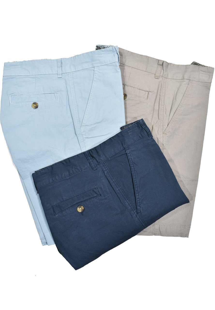 Double stone washed and stretch fabric make these shorts great for comfort. Mid thigh length and classic pockets. Navy, Sky or Tan  2 front slash pockets 2 back welt pockets with button closures Mid rise Stain resistant